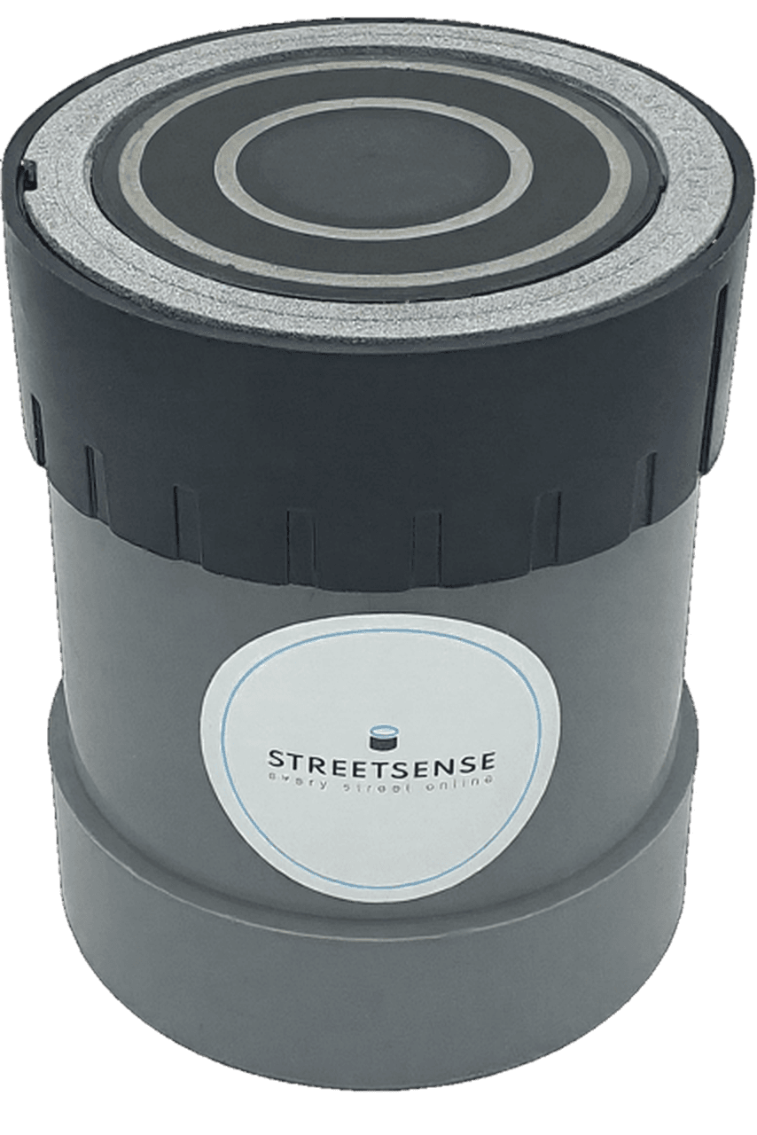 StreetSense IoT traffic sensor, a compact cylindrical device with concentric ring top and StreetSense branding